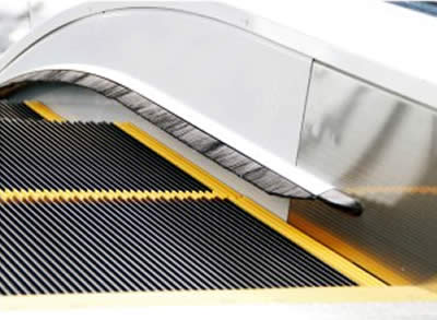 Components of travolators: Skirt panel brush